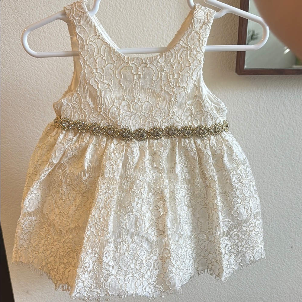 Elegant Ivory Lace Baby Dress with Gold Accents